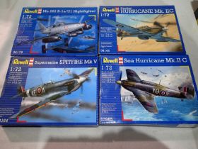 Four 1/72 Revell aircraft kits, Hurricane, ME262, Sea Hurricane, and Spitfire, all appear factory
