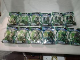 Twelve Mattel Green Lantern figures including four Hal Jordan, two Test Pilot, Hannu, Green Man,