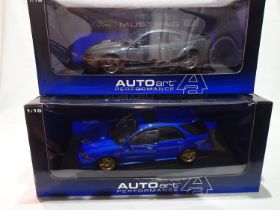 Two Auto Art 1/18 scale cars, Ford Mustang Mach 1 2004 40th Anniversary model and Subaru New Age