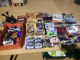 Twenty five boxed/carded vehicles, metal and plastic, various makes and types, mostly mint, wear