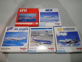 Five Herpa 1/500 scale airliners, various types and liveries, mostly excellent condition and