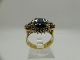 18ct gold yellow and white gold cluster ring set with sapphire and diamonds, 0.52ct diamonds, size