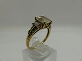 9ct gold Art Deco style ring set with cubic zirconia, size O/P, 2.8g. UK P&P Group 0 (£6+VAT for the