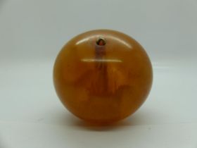 Large globular butterscotch amber pendant, H: 50 mm, few bumps, light scratches, no cracks or