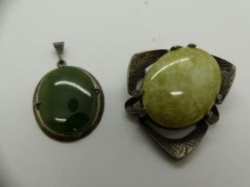 Miracle stone set brooch with a jade pendant in a silver mount, largest H: 40 mm. UK P&P Group 0 (£