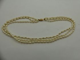 Triple strand pearl necklace with 9ct gold clasp, L: 40 cm. UK P&P Group 1 (£16+VAT for the first