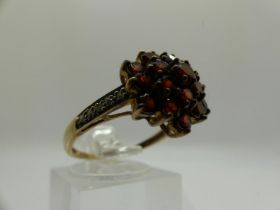 9ct gold cluster ring set with garnets and diamond set shoulders, size P, 2.8g. UK P&P Group 0 (£6+