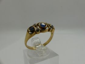18ct gold Art Deco ring set with sapphires and diamonds, size N, 2.5g. UK P&P Group 0 (£6+VAT for