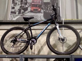Kaisa Indi bike with 19 inch frame and 27 inch wheels, 15 speed, shox. Not available for in-house
