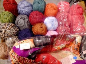 Twenty eight balls of knitting wool, including Red DK perfect. Not available for in-house P&P