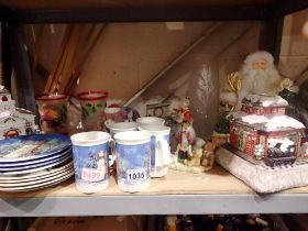 Shelf of mixed Christmas related items, including ceramics and Cherished Teddies. Not available