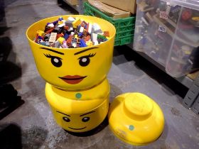 Two Lego heads, Mr & Mrs, both full of loose Lego. Not available for in-house P&P