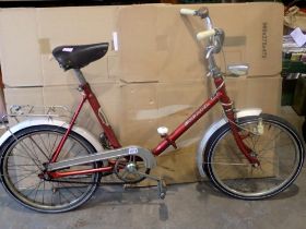 Corona red single speed folding bike, flat tyres, light chrome oxidation, mudguards in tact,