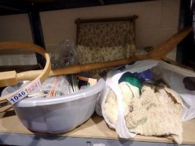 Tub of mixed sewing and knitting items, including an embroidery circle on stand. Not available for
