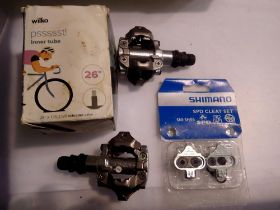 Shimano pedals and an SPD cleat set. Not available for in-house P&P