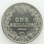 1885 silver shilling of Queen Victoria, VF grade. UK P&P Group 0 (£6+VAT for the first lot and £1+