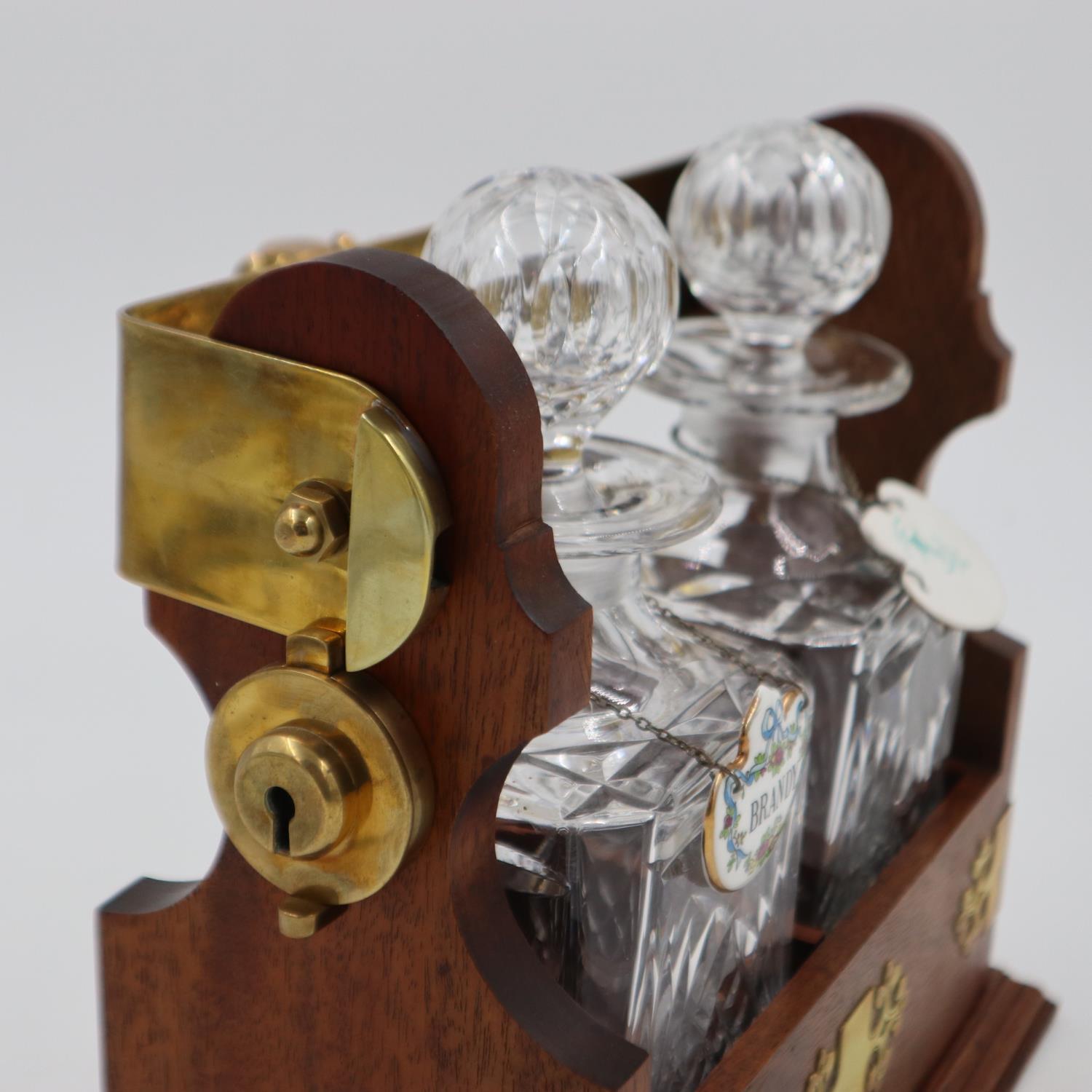 Two decanter locking tantalus (H: 28 cm)with solid mahogany frame, brass fittings and two associated - Image 3 of 4