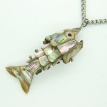 Mother of pearl articulated fish pendant on a white metal chain, pendant L: 70 mm. UK P&P Group