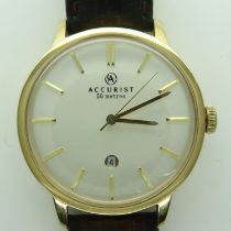 ACCURIST: gents gold plated wristwatch with date aperture, on leather strap, working at lotting.