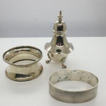 Hallmarked silver pepperette together with two napkin rings, combined 40g. UK P&P Group 1 (£16+VAT