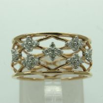 18ct gold pierced ring set with diamonds, size P/Q, 4.9g. UK P&P Group 0 (£6+VAT for the first lot