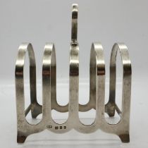 Hallmarked silver four-slice toast rack, 82g. UK P&P Group 1 (£16+VAT for the first lot and £2+VAT