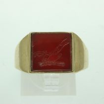 9ct gold signet ring, set with a carved carnelian intaglio displaying a plough, size U, 7.8g. UK P&P