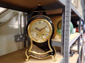 An Eluxa chiming mantel clock with key. Not available for in-house P&P