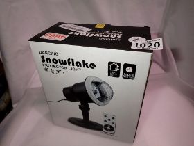 New old stock dancing snowflake projector light for outdoor and indoor use with remote, working at