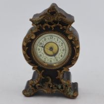 Ornate miniature mantel clock, H: 13 cm. UK P&P Group 2 (£20+VAT for the first lot and £4+VAT for