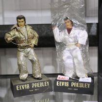 Two Elvis models, H: 25 cm. UK P&P Group 3 (£30+VAT for the first lot and £8+VAT for subsequent