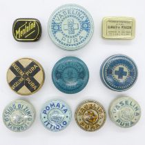 Ten WWI empty Italian Vaseline tins. Originally, they would have been used as a lip balm against