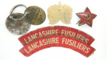 Lancashire Fusiliers pair of shoulder titles, two post-war dog tags and an enamelled Soviet badge.