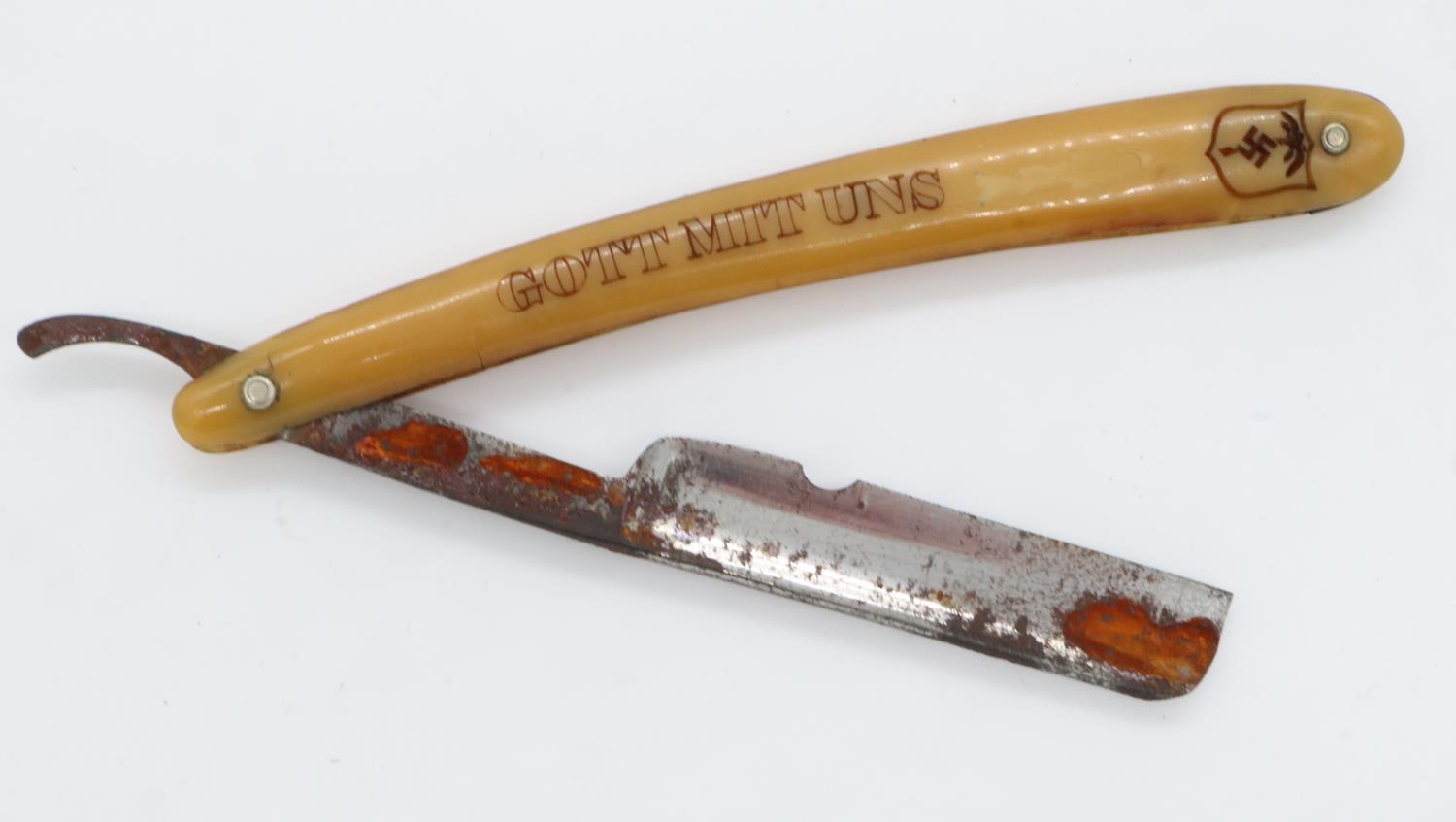 WWII German Africa Corps Patriotic Cutthroat Razor. There is a chip in the blade. UK P&P Group 1 (£