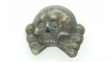 A German WWII Allgemaine pressed metal SS cap badge. UK P&P Group 1 (£16+VAT for the first lot