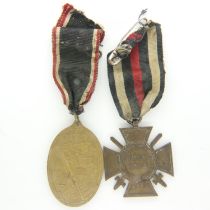 Imperial German WWI Hindenburg Cross, marked RV26 Pforzheim verso, and a Veteran Service medal (