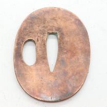 Japanese early 20th century copper tsuba, L: 5 cm, W: 6 cm, D: 2 mm. UK P&P Group 1 (£16+VAT for the