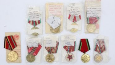 Soviet medals and awards, many with annotations and three with paperwork. UK P&P Group 1 (£16+VAT