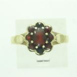 14ct gold ring set with garnets, size P, 2.8g. UK P&P Group 0 (£6+VAT for the first lot and £1+VAT