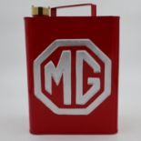 Red MG petrol can with brass cap, H: 34 cm. UK P&P Group 3 (£30+VAT for the first lot and £8+VAT for
