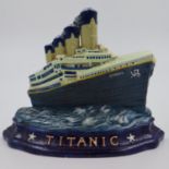 Cast iron doorstop of SS Titanic, L: 27 cm. P&P Group 2 (£20+VAT for the first lot and £4+VAT for