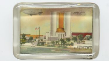 Rectangular glass paperweight for the Chicago World Fair showing the Federal building and an