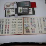 Two stamp albums containing mainly mint British stamps, a box of loose stamps and two albums of