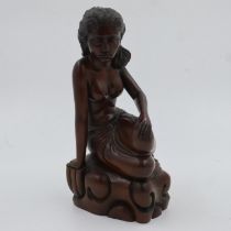 Hardwood figure of a semi nude female, signed Klungxung, H: 33 cm. UK P&P Group 2 (£20+VAT for the
