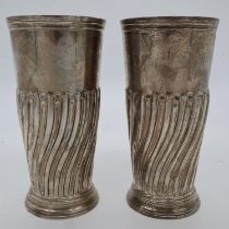 Pair of Silver hallmarked, London assay vases, H: 18 cm, 590g. External toning to both faces, no