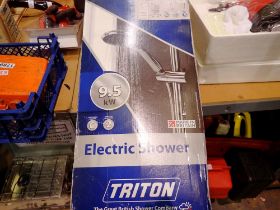 Triton electric shower. Not available for in-house P&P