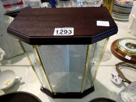 Quantity of miniature crystal ornaments with a display cabinet and two shelves, and brass scales.