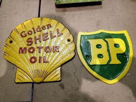 Two cast iron signs, Shell Motor Oil and BP, L: 20 cm. UK P&P Group 2 (£20+VAT for the first lot and