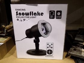 New old stock Dancing Snowflake Projector Light for outdoor and indoor use with remote, boxed,