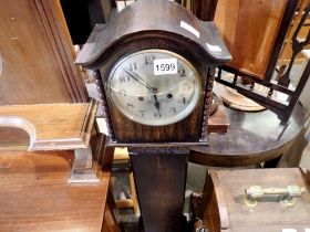 Oak cased granddaughter clock, cracked glass. Not available for in-house P&P